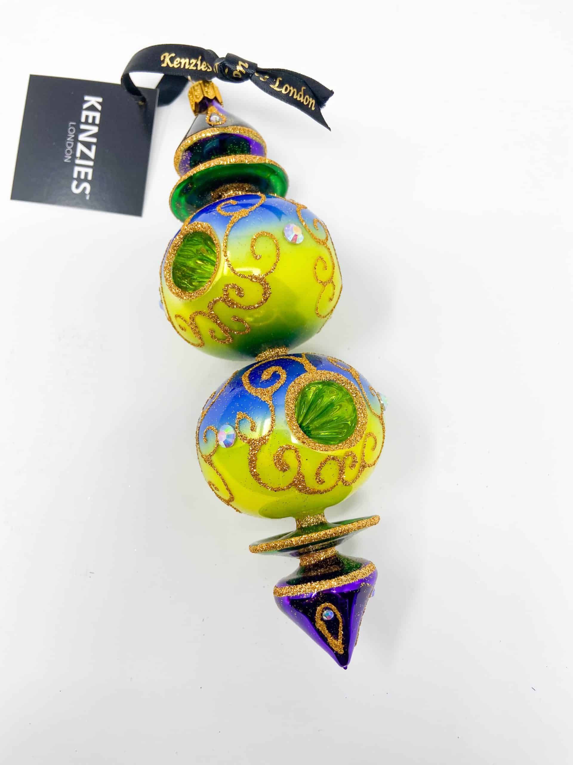 Las Vegas collection ornament featuring spinning reflector and rainbow neon colors reflecting the Las Vegas Strip. Inspired by casinos. Christmas ornament made from hand blown polish glass.