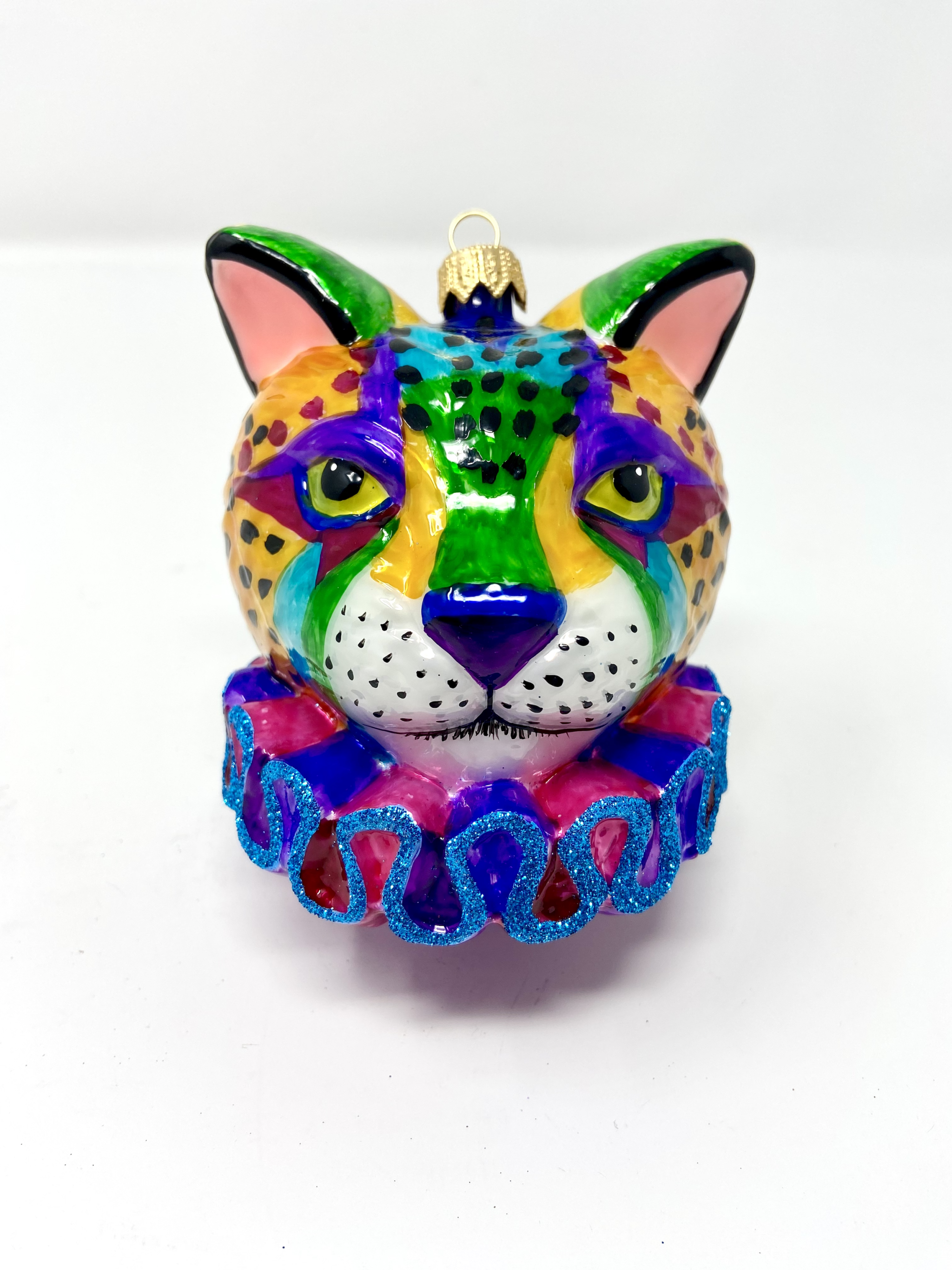 colorful rainbow cheetah glass ornament with dayglo 1980s and 1990s color patterns