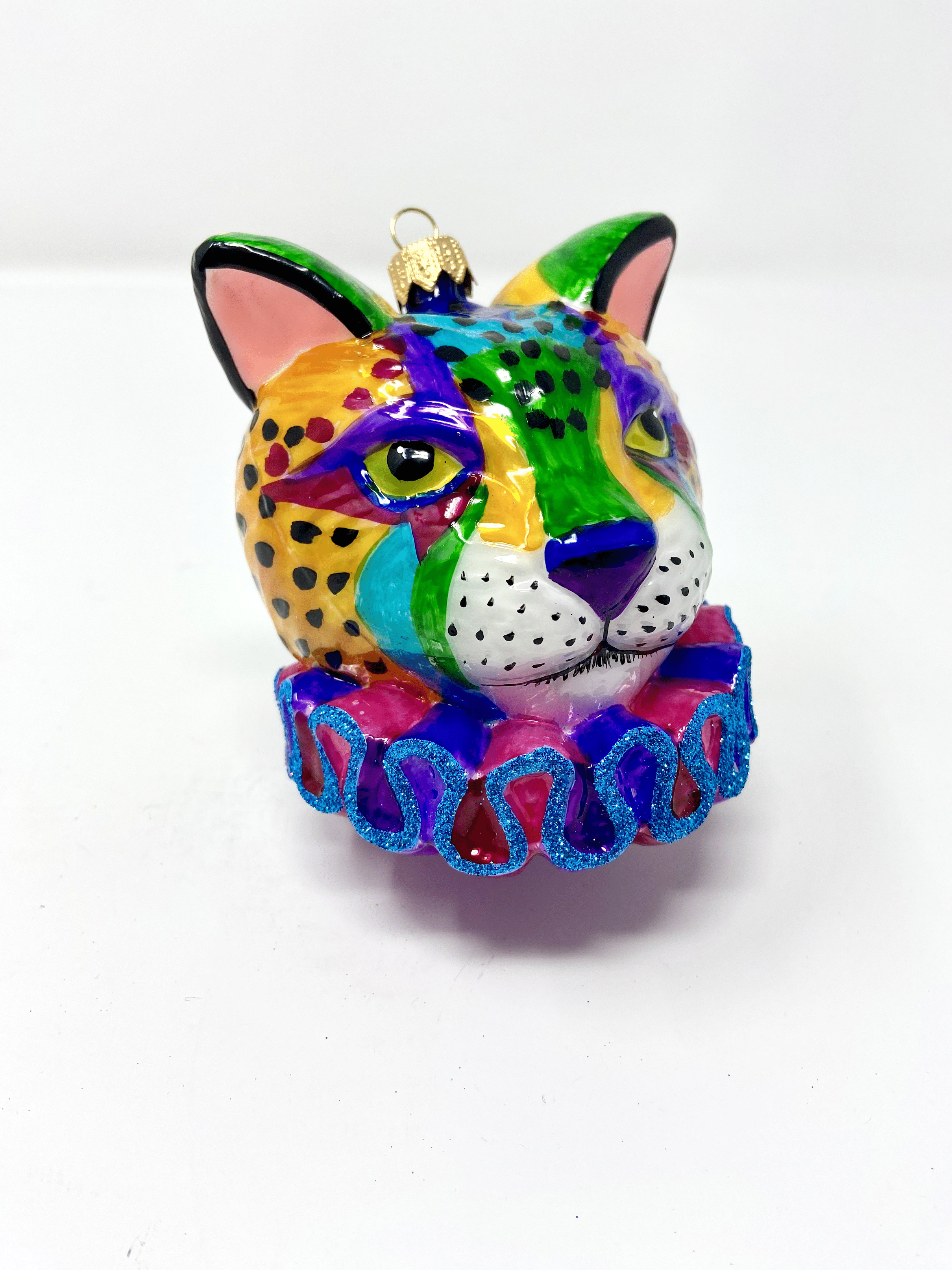 colorful rainbow cheetah glass ornament with dayglo 1980s and 1990s color patterns