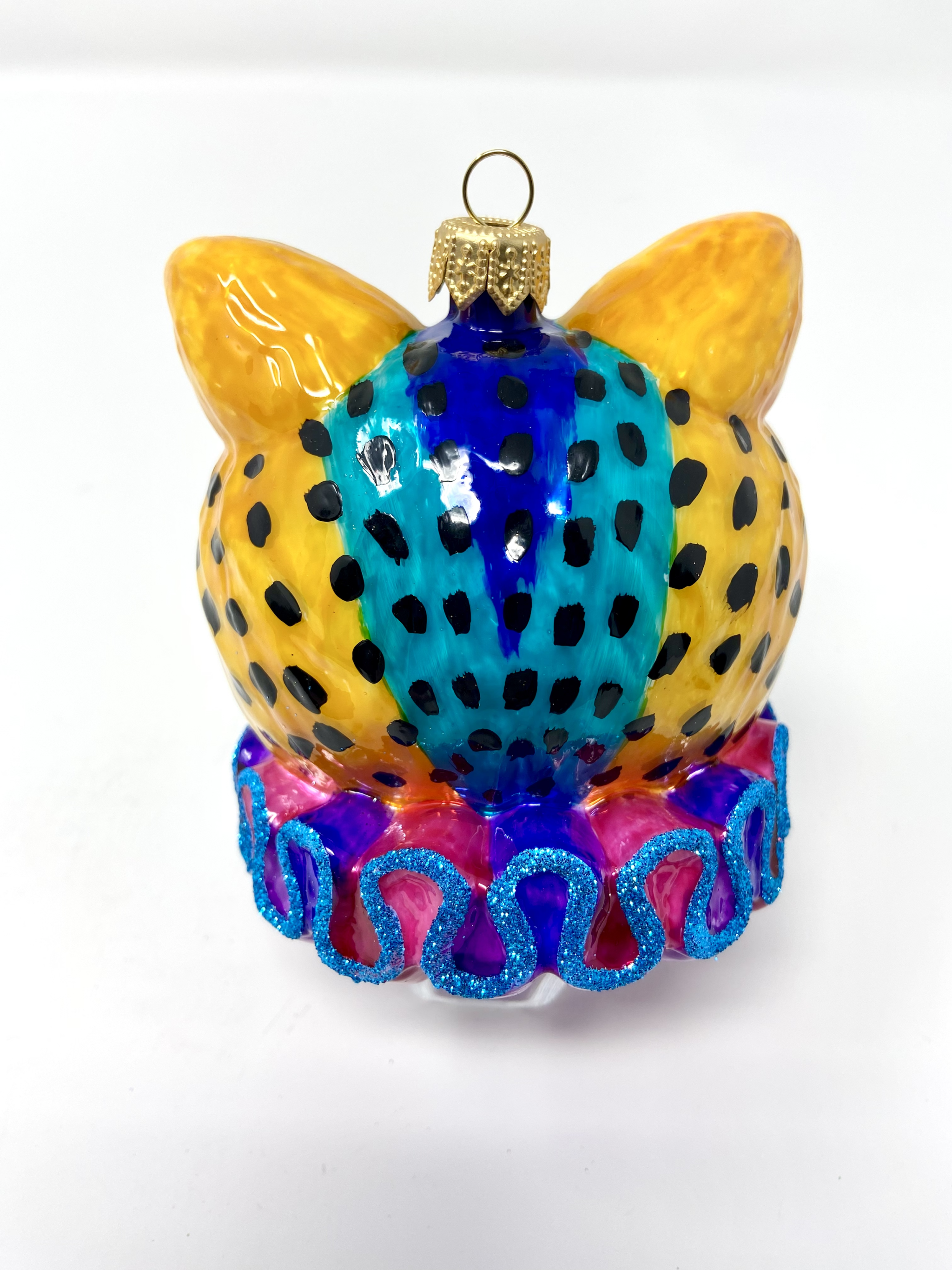 colorful rainbow cheetah glass ornament with dayglo 1980s and 1990s color patterns