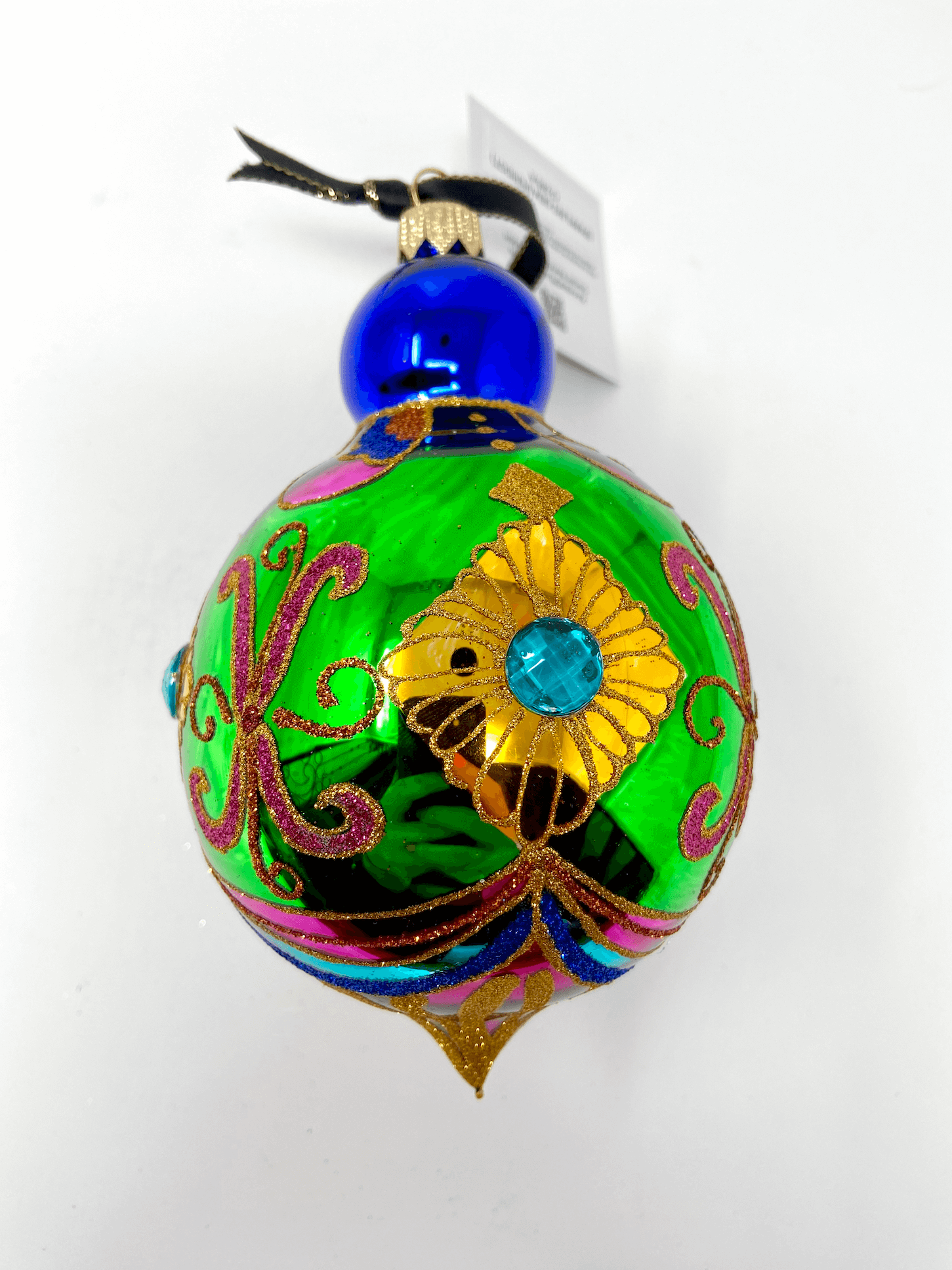 Gorgeously intricately detailed colorful polish glass ornament with gold detailing and colorful accents.