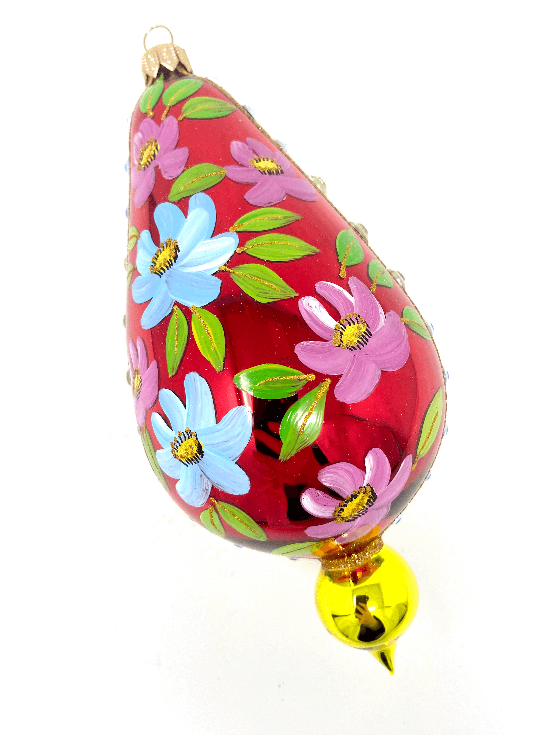 Red eggplant shaped ornament featuring gemstones, intricate gold detailing, and hand painted floral blooms. A Christmas polish glass ornament. Floral Escape Floral Fetish.