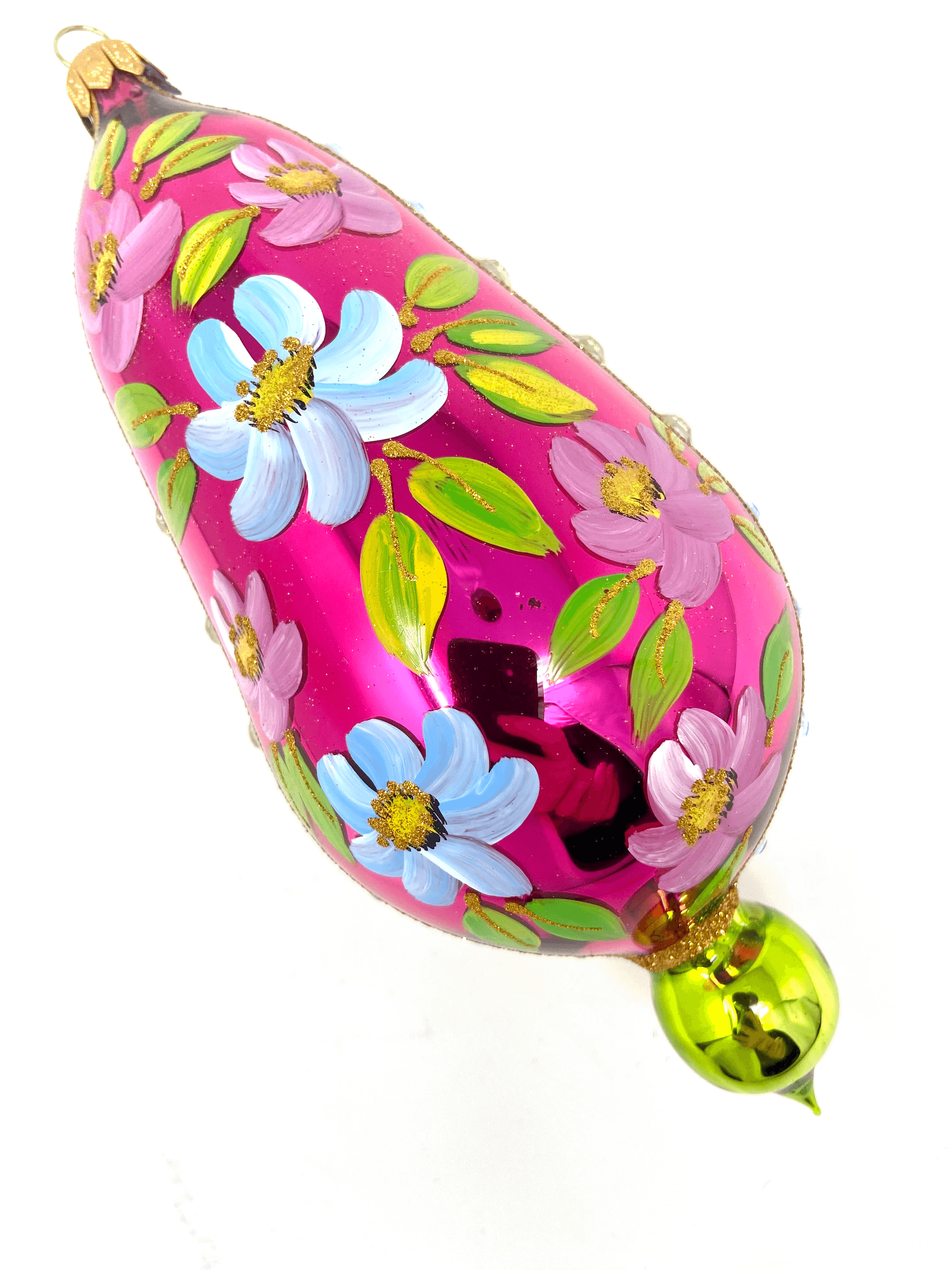 Pink eggplant shaped ornament featuring gemstones, intricate gold detailing, and hand painted floral blooms. A Christmas polish glass ornament. Floral Escape Floral Fetish.