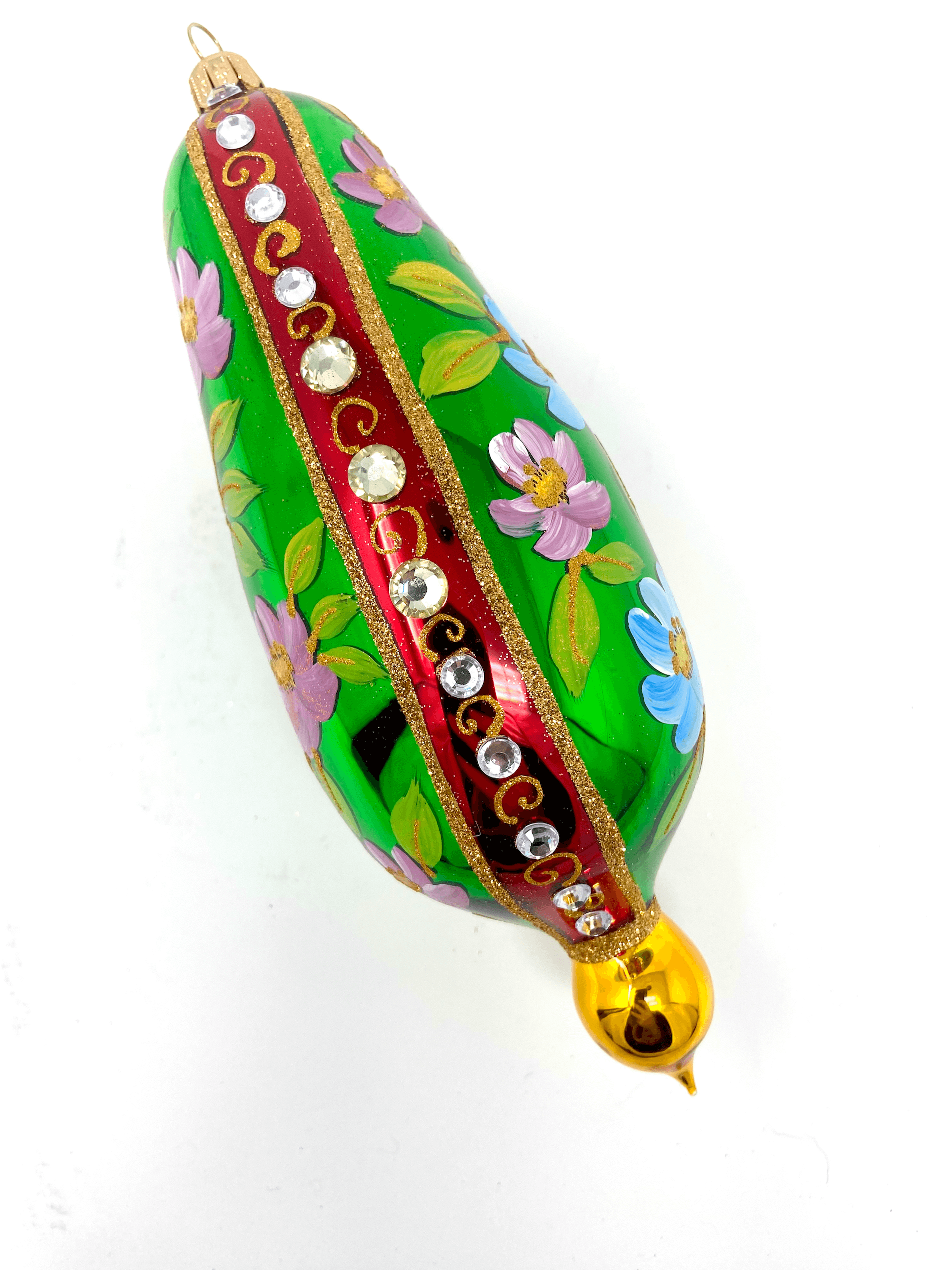 Green eggplant shaped ornament featuring gemstones, intricate gold detailing, and hand painted floral blooms. A Christmas polish glass ornament. Floral Escape Floral Fetish.